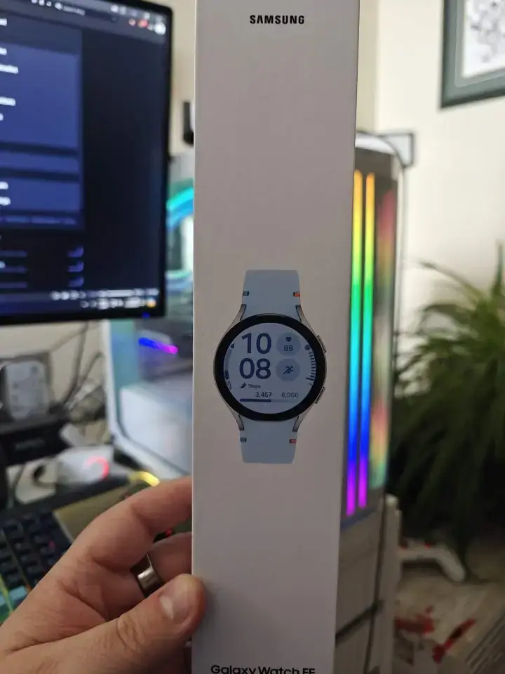 Unboxing the Samsung Galaxy Watch FE and showcasing its minimalist design and budget-friendly features.